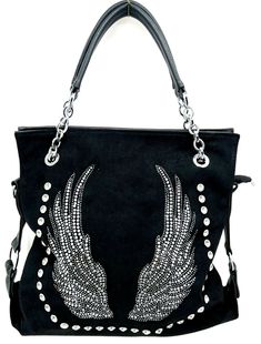 This listing is for (1) Wings Design Rhinestone Handbag Add a touch of edge to your outfit with this black faux leather crossbody bag from TnT Biker Apparel. Featuring wing design, studded accents, buckles, and rhinestones, this bag is perfect for travel, party, casual, and formal occasions. The bag has a zipper closure and adjustable strap with a drop of 12 to 23 inches. With a size of 13L x 12.5H x 4.5W inches, the bag has enough space for your essentials. The interior is lined with linen and Rhinestone Purse, Rhinestone Handbags, Wing Design, Suede Purse, Fashion Purses, Biker Outfit, Studded Bag, Wings Design, Chrome Hardware