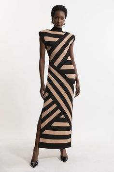 Elevate Your Evening Wardrobe In Our Statement Midaxi Dress, With A Figure Hugging Silhouette, Structured Shoulders, And A Monochrome Stripe Pattern That Is Certain To Turn Heads. Style It With Heels, Loafers, Or Sandals For An Occasion Look That Goes Seamlessly From Day To Night. Viscose Blend Jacquard Stripe Power Shoulder Knit Midaxi Dress High Quality Knit Fabric Striking Stripe Pattern Formal, High Neckline Thigh High Leg Split Accent Unique, Structured Shoulders Figure Hugging Fit Keyhole Petite Wedding Guest Dresses, Hen Do Outfits, Bride Jumpsuit, Wedding Pants, Wedding Guest Outfit Fall, Theatrical Romantic, Winter Wedding Guest Dress, Transitional Fashion, Summer Bridesmaid Dresses