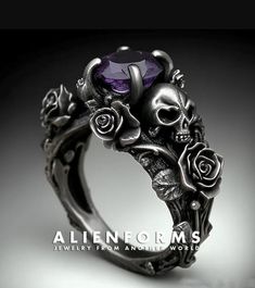 ♦ Gothic skulls engagement ring. Made in sterling silver, set with purple amethyst center stone ♦ Made to order ♦ Available in all ring sizes ♦ Comes in an elegant ring box  ♦ Designed and Handcrafted in house Gothic Rings Wedding, Halloween Engagement Ring, Vampire Wedding Ring, Emo Wedding Rings, Wedding Ring Purple, Black Stone Wedding Ring, Gothic Promise Rings, Unique Skull Shaped Anniversary Rings