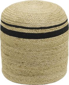 a black and white striped hat on top of a large round ottoman or poufce