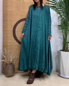 "【Fabric】 linen Lining  cotton 【Color】 Brown, peacock blue, purple 【Size】  Shoulder width is not limited Shoulder + Sleeve Length 68cm / 26\" Bust 130cm / 50\" Length 123cm / 47\" Washing & Care instructions: -Hand wash or gently machine washable do not tumble dry -Gentle wash cycle (40oC) -If you feel like ironing (although should not be necessary) , do it with steam or while the dress is still slightly wet -Do not bleach If you like this dress, perhaps you will also like other dresses from our Cotton Lagenlook Maxi Dress With Long Sleeves, Bohemian Cotton Dress In Solid Color, Bohemian Solid Color Cotton Dress, Blue Bohemian Linen Long Sleeve Dress, Blue Bohemian Long Sleeve Linen Dress, Bohemian Long Sleeve Solid Color Maxi Dress, Bohemian Long Sleeve Dress In Natural Fiber, Long Sleeve Bohemian Maxi Dress, Blue Linen Long Sleeve Maxi Dress