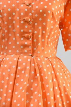 "Vintage 1950s silk shirtwaist dress. Lightweight silk with bright orange and cream polka dots all over. V collar, capped sleeves and nipped waist. Pleat in back. Free skirt. Front button closure. Loops for belt, no belt. State of garment | good, underarm stains and a few small spots in back of sleeves. Measurements ✂--- Best fit | Small /Medium Bust | up to 41\" Shoulders | about 15\" Shoulder to waist | 16\" Sleeves | 9' cuffed Waist | 26 - snug 26.5\" Hips | free Total length (shoulder to hem 1950's Dresses, Underarm Stains, Vogue Vintage, 1950s Dresses, Happy Dresses, 1950s Outfits, Best Summer Dresses, Shirtwaist Dress, Dress Orange