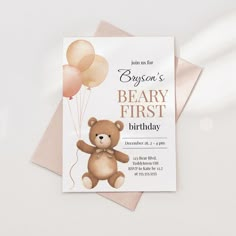 a birthday card with a teddy bear holding balloons on it's back and the words, boston's beary first birthday