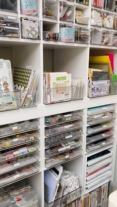 the shelves are filled with many different types of crafting supplies and storage bins