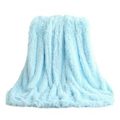 a light blue fuzzy blanket on a white background with clippings to the side