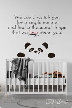 a baby's room with a panda bear wall decal on the wall and a quote that reads, we could watch you for a single minute and find a thousand things that love about you