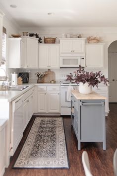 the kitchen is clean and ready for us to use in its new owner's home