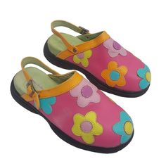 Beautiful And Hard To Find Vintage Hanna Andersson Clogs! Features: Multi-Colored Floral Appliqus, Fully Adjustable And Reversible Straps Size: Eu 35 (Usa 2.5-3) Colors: Bright Pink/Light Pink/Orange/Orchid/Aqua/Pear Materials: Leather Uppers/Leather Insoles/Rubber Soles Made In China. Condition: Like New; Never Worn; However, There Is A Faded Area On The Outer Right Clog, As Seen In Photos. Otherwise, These Clogs Are In Excellent Unused Condition! Smoke-Free, Pet-Friendly Home! This Item Is Cro Comfortable Pink Round Toe Sandals, Multicolor Slip-on Clogs For Spring, Spring Non-slip Round Toe Mules, Casual Slip-on Clogs With Soft Sole, Synthetic Slip-on Clogs For Playtime, Playful Non-slip Slip-on Clogs, Casual Multicolor Mules With Rubber Sole, Multicolor Round Toe Slippers For Spring, Spring Retro Closed Toe Clogs