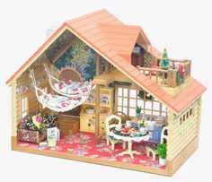 a doll house is shown with furniture and accessories in front of the house's roof