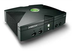 the xbox game system is black and green