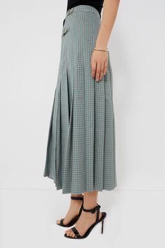 Made from a fabulous plaid material and finished with pleats that give chic structure, the Palladian Check Isla Skirt is a must-have. Striking a balance between cool-girl vibes and effortless sophistication, this midi is an easy style that packs a fashionable punch. Complete with buckle closures at the side with functional appeal since they can adjust the fit of the waist, as well as a hint of stylish edge, this number pairs perfectly with tees, button downs, sweaters, and more. High rise Wrap s Plaid Material, Easy Style, Cocktail Attire, Pleated Midi Skirt, Pullover Sweatshirts, Fall Trends, Simple Style, Day Dresses, Cool Girl