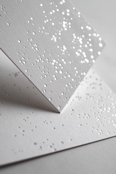 white paper with water drops on it