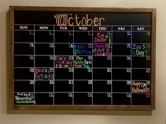 This is a chalkboard calander purchased from Hobby Lobby and decorated for the month of October using Loddie Doddie chalk markers. October Chalk Calendar Ideas, August Calendar 2023 Chalkboard, October Chalkboard Calendar Ideas, October Dry Erase Calendar Ideas, September White Board Calendar Ideas, April Chalkboard Calendar Ideas