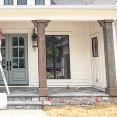 a man is painting the outside of a house