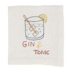 the gin and tonic tea towel is embroidered onto it