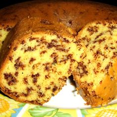 a bundt cake is cut in half on a plate