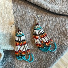 White Tourquoise Black Red Orange And Gold. 3.5”. New Without Tags Western Beaded Fringe Earrings, Sterling Silver Star Earrings, Rainbow Topaz, Vintage Rhinestone Earrings, Winter Earrings, Pink Studs, Native American Beaded Earrings, Crystal Hoop Earrings, Casual Jewelry