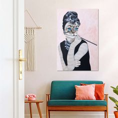 a living room scene with focus on the couch and painting hanging above it's head