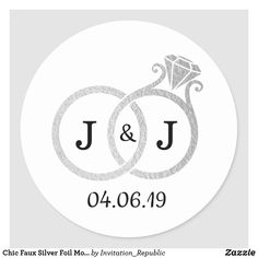 a wedding sticker with two rings and a diamond in the middle, on a white background