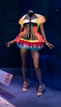 Dress, jumpsuit, xibelani skirt. Worn by Sho Madjozi and designed by Onder Die Invloed. Courtesy of Sho Madjozi. On display at Africa Fashion Exhibition at the V&A (on until 16 April 2023) Sho Madjozi, Fashion Exhibition, Dress Jumpsuit, Antique Dress, Africa Fashion, Apple Accessories, On Display, Festival Fashion, Jumpsuit