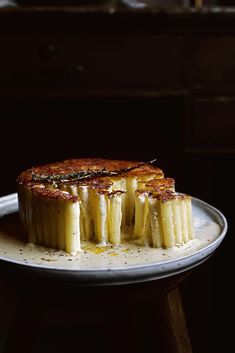 a cake that has been cut into pieces on a plate