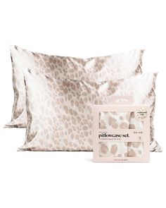 two pillows and one pillow case in leopard print