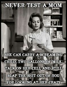 a woman standing in front of a refrigerator holding a piece of paper with the caption never test a mom she can carry a screaming child, two gallons of milk, talk on her cell and still slap