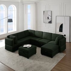 a living room with a large green couch and ottoman