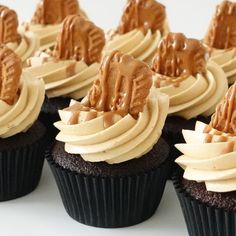 chocolate cupcakes with peanut butter frosting on top