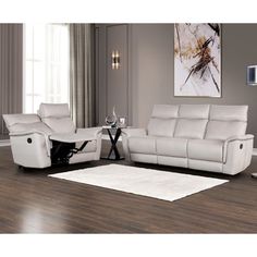 a living room with two reclining sofas and a white rug on the floor