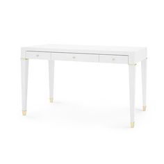 a white desk with two drawers and gold trimmings on the bottom, against a white background