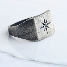 Astrology pole star silver men ring. This ring is inspired by the astrology. You can buy this ring, which will attract all the attention thanks to its flawless handwork details, either 925 sterling silver or silver plated on white bronze.both materials are produced with the same craftsmanship and have the same appearance.This unique ring, which those who see it will look at again and cannot take their eyes off, will be packaged appropriately for gifting. MATERIALS: - Solid 925 sterling silver - White Bronze ( silver plated )  SHIPPING: - We use International P Shipping Service - 3-10 Business Days PACKAGING: -all your orders will be shipped with good packaging suitable for gifting North Star Ring, Silver Pinky Ring, Mens Silver Jewelry, Star Silver, Pole Star, Men Ring, Ring Stone, Silver Engraving, Mens Ring