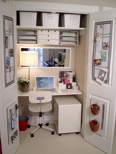 an organized home office with lots of storage space and white desks in the corner