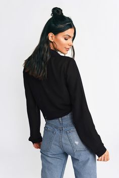 Feel At Ease In The It'S A Tie Black Blouse! This Long Sleeve Crop Top Features A Wrap Bodice, Plunging Neckline, And A Cute Front Tie. Pair This Cropped Top With Light Washed Flare Jeans And Ankle Strapped Heels For An Easy 'Fit That Looks Super Chic. Cropped Blouse For Date Night In Fall, Cropped Blouse For Fall Date Night, Chic Stretch Long Sleeve Wrap Top, Chic Long Sleeve Stretch Wrap Top, Chic Fall Tops, Stretch Long Sleeve Crop Top For Date Night, Long Sleeve Wrap Top For Night Out In Spring, Trendy Fitted Wrap Top For Fall, Long Sleeve Wrap Top For Spring Night Out