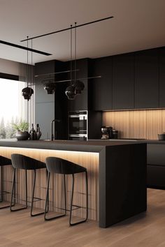 an image of a modern kitchen setting with bar stools in the center and lights hanging from the ceiling