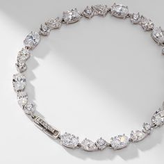 Glam up your wrist with this glistening mixed stone cubic zirconia line bracelet. ABOUT THE PRODUCT: Metal: Brass Plating: Rhodium Stones: Cubic Zirconia Length: 7.25in Nadri Jewelry, Modern Love, Fine Jewellery Earrings, Brass Color, Ring Bracelet, Earring Necklace, Jewelry Sales, Anklets, Diamond Bracelet