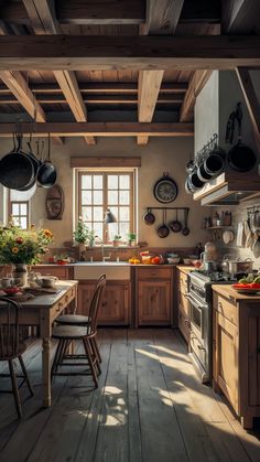 a kitchen filled with lots of wooden furniture and pots on top of the stoves