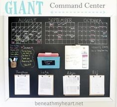 a chalkboard with calendars and other things on it that says giant command center