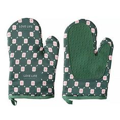 the oven mitts are green with pink flowers and words love life written on them