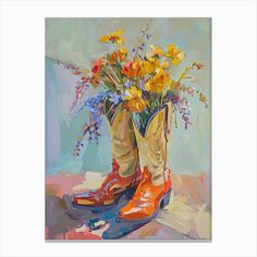 a painting of cowboy boots with flowers in them