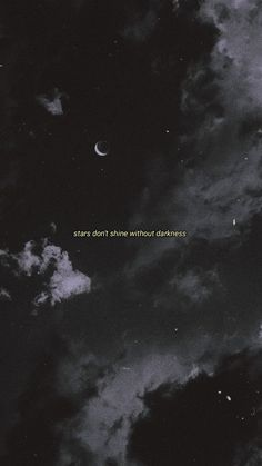 the sky is filled with dark clouds and stars