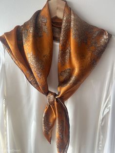 "**Apply SAVE15 promo code to get 15% off for orders of $60 or more until Feb 29th. (see shop announcement) Elegant and vintage style Chrysanthemum prints natural mulberry silk scarf with size of 88 cm x 88 cm / 35 in x 35 inch. Hand stitched edges. Warm orange background colors, with antique-styled chrysanthemums, with a subtly vintage feel. The deep brown border ties visually tie the scarf together, adding an elegant feel to the entire print. Versatile, smooth and lustrous silk charmeuse fabri Brown Border, Evening Shawls, Charmeuse Fabric, Silk Neck Scarf, Scarf Hair, Dress With Shawl, Silk Set, Scarf Silk, Dress Hairstyles