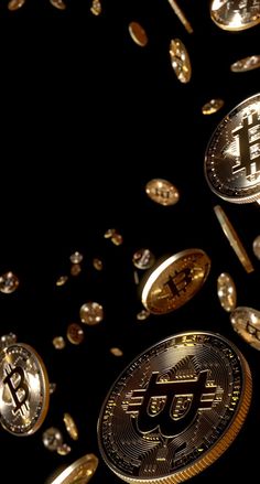 bitcoins falling down into the air on a black background with lots of gold coins