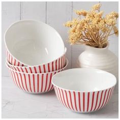 Dimensions: 2.5" H x 5.48" W x 5.48" D Volume: 18 Fluid Ounces (532ml) Material: Ceramic Color: Red & White Pattern: Stripes Care & Safety: Food, Microwave & Dishwasher Safe Quantity: 4 Make any occasion celebratory when you eat from these Striped Cereal Bowls! This beautiful set comes with four bowls that have a white body with a colorful striped pattern around the bowl's exterior. Their glossy coating makes these bowls shine in the light. Pair these bowls with dinner plates to make your dinner party stylish! Food Microwave, Ceramic Color, Cereal Bowls, White Patterns, Dinner Plates, Dinner Party, Cereal, Dinnerware, Red White