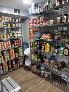 the shelves are full of food and condiments in this grocery store's pantry