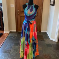 You Will Look Stunning In This Gorgeous Bright Colored Halter Dress Perfect For A Formal Occasion. Has I Tie Bow And Side Zipper. Size 8. Nwt Vibrant Blue Maxi Dress For Party, Lined Multicolor Midi Dress For Vacation, Vibrant Blue Party Maxi Dress, Vibrant Blue Fitted Maxi Dress, Multicolor Lined Maxi Dress For Party, Lined Multicolor Maxi Dress For Party, Vibrant Blue Party Dress, Vibrant Blue Dresses With Colorful Pattern, Multicolor Midi-length Lined Dress