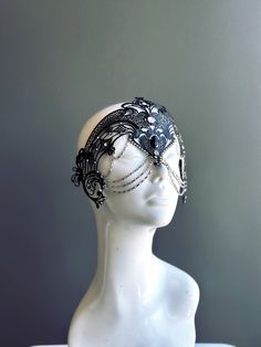 Step into the realm of goddesses with our women's masquerade mask in black. Rhinestones delicately embellish the mask, adding a touch of sparkle. Silver chains gracefully adorn the mask, creating an enchanting movement. Capture attention at any masquerade party, ball, or themed event!


Age Group/Gender - Adult/Women

Size/Type - One size fits all adults

Mask Color - Black

Mask Material - Laser Cut Metal

Special Features - Chains and rhinestones Dark Masquerade Mask, Gothic Full Face Mask For Masquerade, Gothic Full Face Masquerade Masks, Black Full Face Masks For Carnival, Full Face Masquerade Mask For Halloween Party, Full Face Halloween Masquerade Mask For Party, Full Face Black Masquerade Mask For Costume Party, Elegant Adjustable Headpieces For Costume Party, Adjustable Eye Mask For Festival