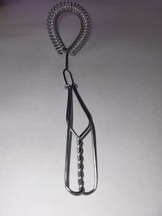 Wire whisk with no visible labels or brands.  It is approximately 11 inches long.  There is some wear.  Please see photos.  Sold as found. Thank you for the interest in this item.  Please also take a look at my store and other listings.  If you are interested in multiple items, I will combine shipping when feasible.  https://lbcvintagefinds.etsy.com Wire Whisk, Cooking Utensils, Long Beach, 11 Inches, Gadgets, Etsy Accessories, Accessory Gift, Gift Card, Pet Supplies