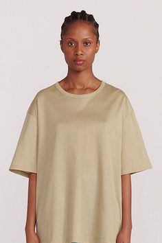 The oversized fit of this Cotton Tee presents a dynamic style in a sophisticated basic. Similar to silk knits we've seen, this cotton stands above the rest, elevated and somewhat shimmery. Expect a generous oversized fit from the size of your choice. DETAILS 100% mercerized cotton. Woven in Italy. Round collar. Straight sleeves with dropped shoulders. Oversized t-shirt. Machine wash at 30°C. Made in Poland. SIZE Diamy measures 5'8" and is wearing a size 1. Measurements: Chest 31.5 / Waist 23.5 / Derek Rose, Knit Shoes, Silk Knit, Birthday Shopping, Rachel Comey, Childrens Gifts, Architecture Fashion, Oversized T Shirt, Blouse Dress