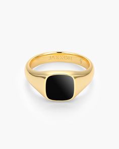 At JAXXON, we love mixing classic designs with modern elements. Our men’s gold Square Signet Ring has a shiny gold band accented with a sleek black epoxy square. This contemporary signet ring may not contain your family seal, but it shows off your strength and confidence every time you wear it. Family Seal, Signet Ring Men, Modern Elements, Solid Gold Chains, Gold Signet Ring, Silver Shop, Size 10 Rings, Men's Rings, Pendant Bracelet